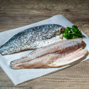 Barramundi,Fillets,With,Parsley,On,Wax,Paper
